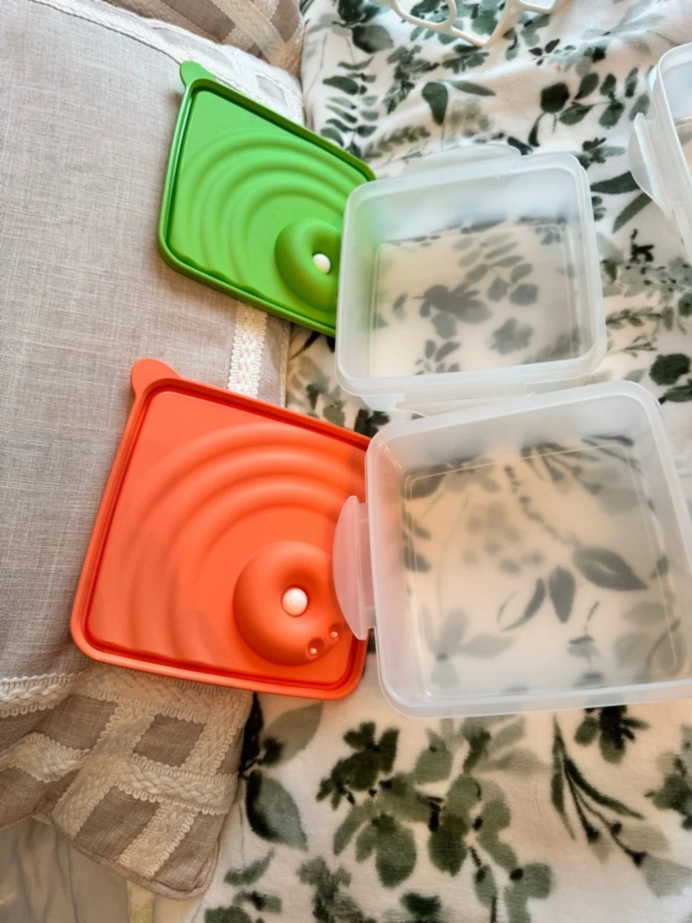 Tupperware Stacked food storage containers with carrier handle